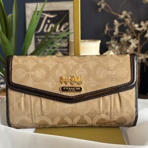 Coach Madison Trifold Wallet featuring the "Op Art" signature jacquard print